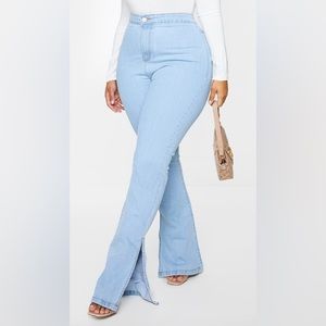 Vintage Wash Knee Rip Flared Jeans | Light Wash